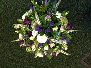 white and purple posy From £55