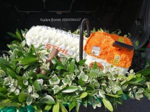 chain saw funeral flowers